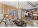 Inviting living room features exposed brick, an open layout, and industrial chic elements at 791 Wylie Se St # 1111, Atlanta, GA 30316