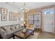 Inviting living room features brick accent wall, modern lighting, and cozy seating arrangement at 791 Wylie Se St # 1111, Atlanta, GA 30316