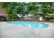 Inviting outdoor pool with lounge chairs and lush greenery for relaxation and recreation at 791 Wylie Se St # 1111, Atlanta, GA 30316
