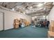 Spacious basement area featuring exercise equipment and storage areas, ready for customization at 1414 Lynchburg Trce, Grayson, GA 30017
