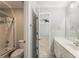 Bathroom with tub-shower combo and a single vanity featuring drawers and cabinet space at 1414 Lynchburg Trce, Grayson, GA 30017