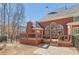A spacious deck with a paved walkway and fenced in backyard at 1414 Lynchburg Trce, Grayson, GA 30017