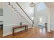 Grand foyer with hardwood floors, staircase, and chandelier at 1414 Lynchburg Trce, Grayson, GA 30017