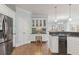 Spacious kitchen featuring stainless steel appliances, and granite countertops at 1414 Lynchburg Trce, Grayson, GA 30017