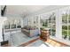 Bright living room with large windows and comfortable seating at 1414 Lynchburg Trce, Grayson, GA 30017