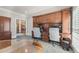Office area with built-in desk and custom cabinetry at 1414 Lynchburg Trce, Grayson, GA 30017