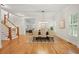 Spacious dining area with hardwood floors, neutral decor, and ample seating at 1456 Hedgewood Nw Ln, Kennesaw, GA 30152