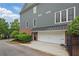 Spacious two-car garage with a driveway and convenient access to the home at 1456 Hedgewood Nw Ln, Kennesaw, GA 30152