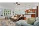 Inviting open-concept living space with hardwood floors connecting living room and kitchen at 1456 Hedgewood Nw Ln, Kennesaw, GA 30152