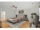 Staged primary bedroom featuring modern decor, natural light, and ample space for relaxation and comfort at 1456 Hedgewood Nw Ln, Kennesaw, GA 30152