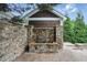 Stunning stone water feature adds a touch of elegance to the outdoor space at 1456 Hedgewood Nw Ln, Kennesaw, GA 30152