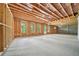 Spacious unfinished basement with framed walls and windows offers customization potential and abundant natural light, great for development at 155 Westbrook St, Buford, GA 30518