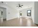 Large, bright bedroom with recessed lighting, ceiling fan, and windows bringing the outside in at 155 Westbrook St, Buford, GA 30518