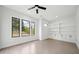 Inviting office with built-in shelving, large windows, and bright natural light at 155 Westbrook St, Buford, GA 30518