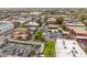 Aerial view showcases commercial buildings, parking lots and mature trees within the surrounding neighborhood at 230 Bradberry Sw St # 9, Atlanta, GA 30313
