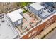 Aerial view of rooftop decks with city views, outdoor seating, and modern design at 230 Bradberry Sw St # 9, Atlanta, GA 30313