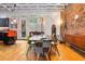 Bright and airy dining area, featuring hardwood floors, open to the kitchen, and ample natural light at 230 Bradberry Sw St # 9, Atlanta, GA 30313
