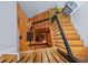 Stylish staircase with black railings and wooden steps, creating a visually appealing and functional design element at 230 Bradberry Sw St # 9, Atlanta, GA 30313