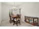 Elegant dining room featuring a chandelier, and natural light at 28315 Plantation Ne Dr, Atlanta, GA 30324