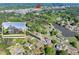 Aerial view of a neighborhood with lush greenery, tree coverage and nearby shopping centers, offering suburban appeal at 1135 Azalea Cir, Conyers, GA 30013