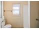 Functional bathroom with a standard toilet and a partially visible tub/shower combination at 1135 Azalea Cir, Conyers, GA 30013