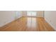 Spacious bedroom featuring beautiful hardwood flooring and bright natural light at 1135 Azalea Cir, Conyers, GA 30013