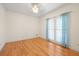 Bedroom with wood floors and plenty of light coming in through the windows at 1135 Azalea Cir, Conyers, GA 30013