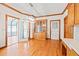 This dining room features wood floors, wood trim, and a large cabinet at 1135 Azalea Cir, Conyers, GA 30013