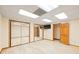 Large empty room with mirrored closet doors, perfect for dance studio or office space at 1135 Azalea Cir, Conyers, GA 30013