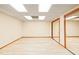Spacious empty room with hardwood floors, perfect for an office or recreation room at 1135 Azalea Cir, Conyers, GA 30013