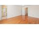 Spacious main bedroom with ensuite bathroom, hardwood floors, and natural light at 1135 Azalea Cir, Conyers, GA 30013