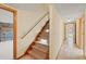 Stairway connecting the main floor to the basement at 1135 Azalea Cir, Conyers, GA 30013