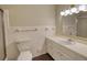 Bathroom with sink vanity, toilet, and tiled floors at 1311 Maple Street Se, Conyers, GA 30013