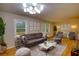 Bright, modern living room with stylish furniture and hardwood floors at 1311 Maple Street Se, Conyers, GA 30013