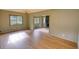 Open concept with fireplace, hardwood floors, and natural light at 1311 Maple Street Se, Conyers, GA 30013