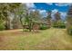 Beautifully maintained yard, mature trees and manicured shrubs surround this brick home at 1311 Maple Street Se, Conyers, GA 30013