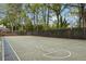 Basketball court with painted lines, hoop, and hopscotch at 2005 Variations Ne Dr, Atlanta, GA 30329