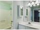 Bathroom featuring tub and shower, vanity with mirror and cabinet at 2005 Variations Ne Dr, Atlanta, GA 30329