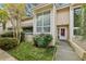 Inviting home exterior with well-maintained landscaping and a charming entrance. Number 2005 displayed on front at 2005 Variations Ne Dr, Atlanta, GA 30329