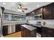Modern kitchen features stainless steel appliances, granite countertops, and a central island at 2005 Variations Ne Dr, Atlanta, GA 30329