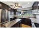 Modern kitchen features stainless steel appliances, granite countertops, and a central island at 2005 Variations Ne Dr, Atlanta, GA 30329