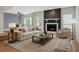 Stylish living room boasts a cozy fireplace, modern furniture, and an open layout at 2005 Variations Ne Dr, Atlanta, GA 30329