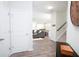 Bright foyer with hardwood floors, an entryway closet, and staircase leading to the second floor at 3080 W Jackson Way, Austell, GA 30106