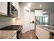 Well-appointed kitchen with stainless steel appliances, granite countertops, and ample cabinet space at 3080 W Jackson Way, Austell, GA 30106