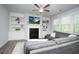 Inviting living room with built-in cabinets and shelving, offering a cozy and functional space at 3080 W Jackson Way, Austell, GA 30106