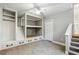 Cozy bedroom features built-in bunk beds, storage, stairs, a ceiling fan and carpet at 3125 Lakeside Dr, Cumming, GA 30041