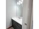 Bathroom with modern vanity and fixtures, plus ample mirror space at 1206 Park Place Dr, Jonesboro, GA 30236