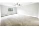 Large bedroom with a ceiling fan and window at 1206 Park Place Dr, Jonesboro, GA 30236