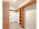 Walk-in closet with shelving and carpeted floor at 1206 Park Place Dr, Jonesboro, GA 30236