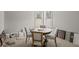 Dining room staging area with design and decor options surrounding the table at 3265 Lions Ruby Ln, Atlanta, GA 30349